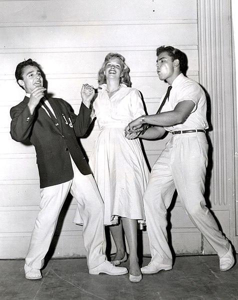 Saxon (right) with Sal Mineo and Sue George in a publicity still photo for Rock, Pretty Baby (1956)