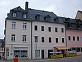 Residential house in closed development and rear building