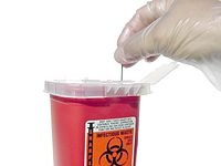 Immediate disposal of used needles into a sharps container is standard procedure. Sharps Container.jpg