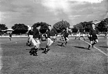 The 1937 Springbok backline in action against Australia. StateLibQld 1 105568 Springboks v. Australia, 1937.jpg