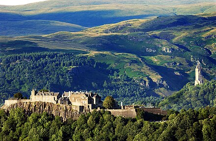 Ochils rising behind Stirling Castle