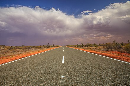 A roadway within the red desert.