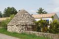 A conical dry-stone roof on a Trullo hut, Apulia, Italy