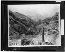 VIEW OF UPSTREAM FACE OF DAM, ALL THREE DOMES VISIBLE WITH EAST BUTTRESS. RIVER DIVERSION IS THROUGH THE EAST DOME, c. 1928 - Coolidge Dam, Gila River, Peridot, Gila County, HAER ARIZ,11-PERI.V,1-18.tif