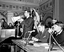 Occupants of the old student hall: Elias Tunkelo holding a megaphone, Marianne Laxen [fi] (right) and Jarmo Makela sitting in front. Vanhan-valtaus-1968a.jpg