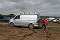 Volkswagen Transporter stuck in mud at Isle of Wight Festival 2012.jpg