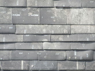 The building is clad with carpet tiles laid with their underlay facing out. Waste House, University of Brighton, Grand Parade, Brighton (September 2015) (7).JPG