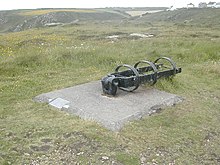 The original pivoted cage which supported a 170 feet (52 metres) mast and antenna erected by the Eastern Telegraph Company in 1902 at Pedn-men-an-Mere near Porthcurno to monitor wireless transmissions by Marconi from Poldhu, across Mount's Bay WirelessPointMastPivot.JPG