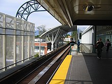 Platform 4 trains travel outbound on the Expo Line.