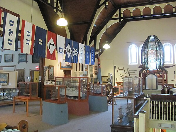 House flags of Yarmouth shipping companies and ship portraits at the Yarmouth County Museum