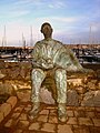 The pastie Supper, sculpture of a man eating a pastie is sited at Bangor Marina.