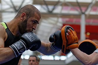 Boxer Engin Karakaplan strikes focus mitts to demonstrate technique during a public training session 20140528 - Engin Karakaplan 10.jpg