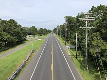 County Route 550 westbound in Woodbine 2021-08-31 10 45 03 View west along Cape May County Route 550 (Dehirsch Avenue) from the overpass for the rail line between Cape May County Route 660 (Fiddler Hill Road) and Heine Avenue in Woodbine, Cape May County, New Jersey.jpg