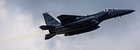 An F-15E Strike Eagle, tail number 01-2003, taking off from RAF Lakenheath in England. The aircraft is assigned to the 494th Fighter Squadron.