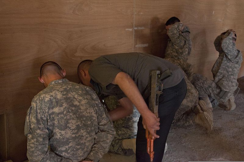 File:An Iraq policemen searches U.S. Army Cpl. Nathan Walker during detention training at Combat Operating Station Kalsu in Babil province, Iraq, May 1, 2011 110501-A-CH809-109.jpg