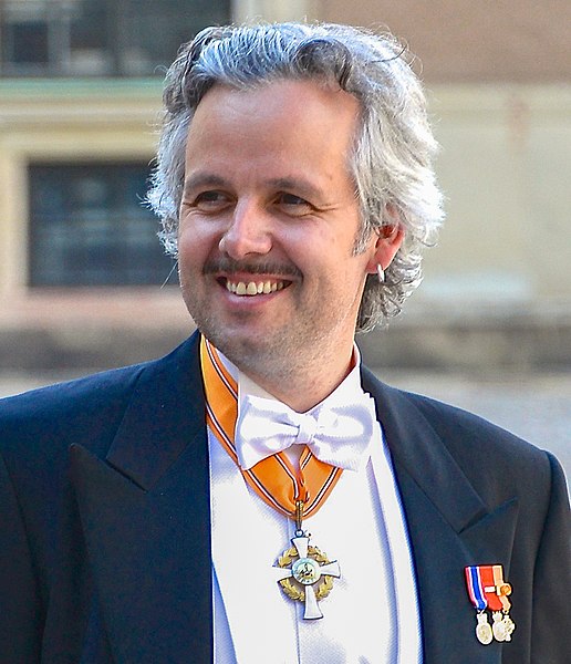 The late Ari Behn in 2013, wearing the badge of the Order on a necklet (his accompanying Star is not shown).