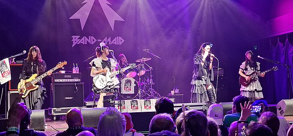 Band-Maid performing at House of Blues in Dallas, October 2022 (L-R: Misa, Miku Kobato, Akane Hirose, Saiki Atsumi, Kanami Tōno)