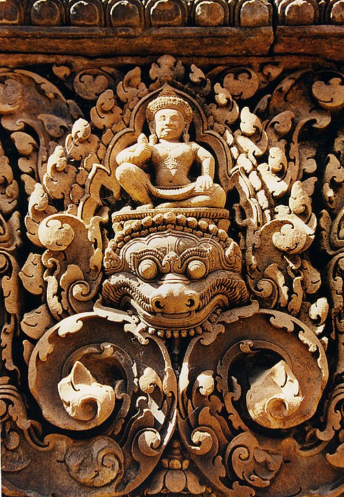 Banteay Srei is known for the intricacy of its carvings. This carving is of a Kala, a mythical animal representative of time and of the god Shiva.