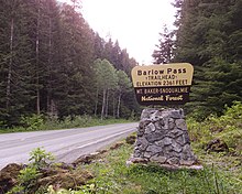 Barlow Pass, near the end of the first paved section Barlow Pass trailhead sign Mountain Loop Highway 2014.jpg