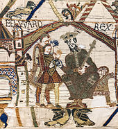 King Edward the Confessor wearing a crown in the first scene of the Bayeux Tapestry Bayeux Tapestry scene1 EDWARD REX.jpg