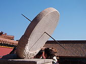 An equatorial sundial in the Forbidden City, Beijing.
.mw-parser-output .geo-default,.mw-parser-output .geo-dms,.mw-parser-output .geo-dec{display:inline}.mw-parser-output .geo-nondefault,.mw-parser-output .geo-multi-punct,.mw-parser-output .geo-inline-hidden{display:none}.mw-parser-output .longitude,.mw-parser-output .latitude{white-space:nowrap}
39deg54'57''N 116deg23'25''E / 39.9157degN 116.3904degE / 39.9157; 116.3904 (Forbidden City equatorial sundial)
The gnomon points true north and its angle with horizontal equals the local latitude. Closer inspection of the full-size image reveals the "spider-web" of date rings and hour-lines. Beijing sundial.jpg