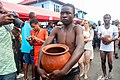 Boy holding pot