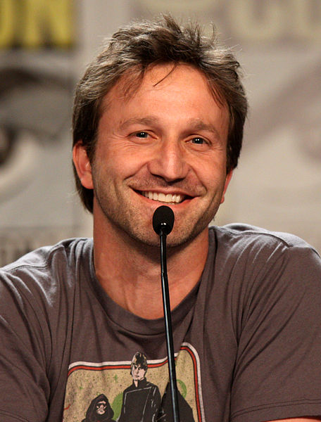Breckin Meyer portrays Jon Arbuckle in the feature film adaptations.