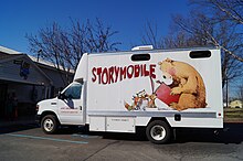 The Storymobile is an outreach vehicle that serves early childhood education facilities. Brown Library early childhood Storymobile.jpg