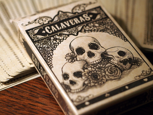 A deck of playing cards featuring a skull motif