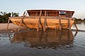 * Nomination Careening of a pirogue, on the tip of a sand beach, at the bank of the Mekong in Don Puay, Si Phan Don, Laos, side view at golden hour. Grounded pirogue, in order to expose one side of its hull for maintenance (tightness, speed) below the water line. --Basile Morin 04:41, 16 March 2020 (UTC) * Promotion  Support Good quality -- Johann Jaritz 05:08, 16 March 2020 (UTC)