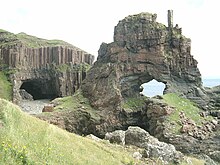 Carsaig Stack on Mull is one of the Carsaig Arches and provides a 15m VDiff climb Carsaig Arches.JPG