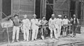 Construction workers and plasterers standing in front of building, between 1888 and 1889 (INDOCC 1809).jpg