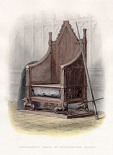 High-backed gothic chair with the Stone of Scone placed into a cavity under the seat and a sword and shield resting on each arm at Westminster Abbey.