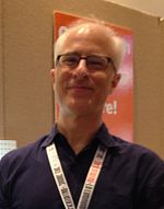 David Rudman (2015), who performs Baby Bear, Cookie Monster, and the Two-Headed Monster David Rudman Cookie Monster puppeteer at SXSW 2015 (cropped).jpg