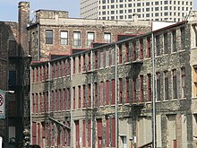 Alley view of Commission Row, before renovation in 2005 Deserted buildings historic third ward milwaukee.jpg