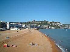 Dover seafront, with the castle overlooking the beach and the valley of the River Dour, behind the line of buildings Dover Seafront And Castle.jpg