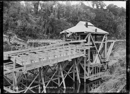 Dry land dredge operating at the lake