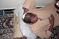 Sahrawi civilian showing his head wounds caused by Moroccan police during a demonstration in Dakhla, 2 March 2011 Essalmani Mohamed Ali.JPG