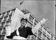 Custode directing traffic, 1950s