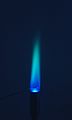 Flame test on copper sulphate seen through cobalt glass