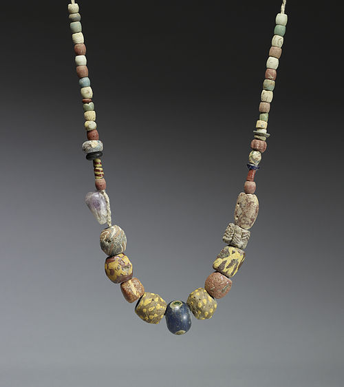A 6th–7th century necklace of glass and ceramic beads with a central amethyst bead. Similar necklaces have been found in the graves of Frankish women 