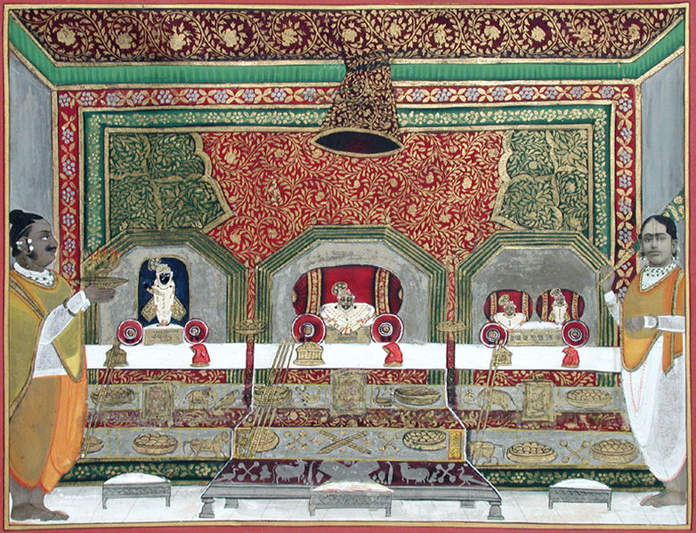 File:In the service of the Lord- priests performing worship in a Vallabha-cult shrine (6124562011).jpg