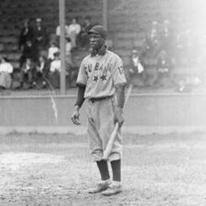 Jose Mendez of the Cuban Stars, seen with a uniform number on his left sleeve during a 1909 game in Chicago Jose Mendez 1909.jpg