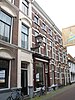 Ondiep woonhuis met restanten van de middeleeuwse stadsmuur