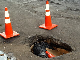 <span class="mw-page-title-main">Pothole</span> Road surface disruption type