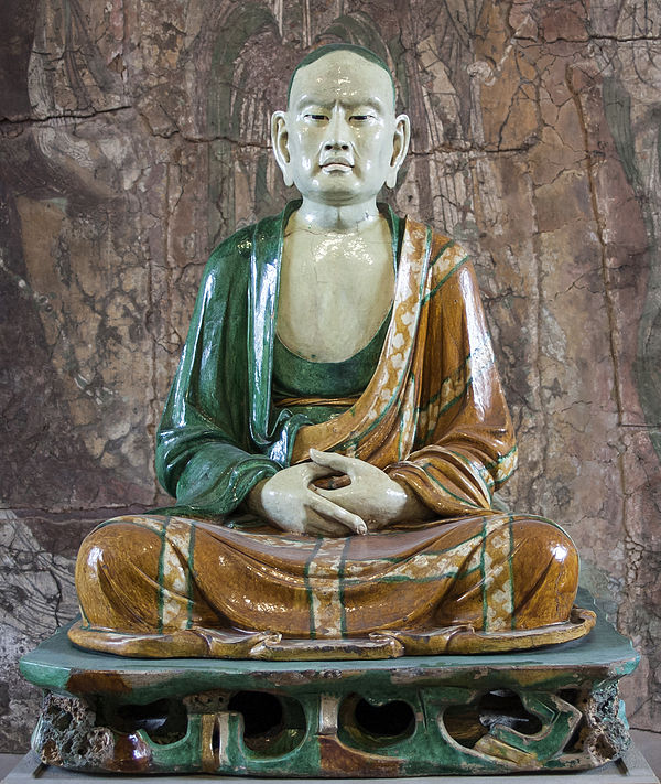 Seated Luohan from Yixian, around 1000, one of a famous Group of glazed pottery luohans from Yixian