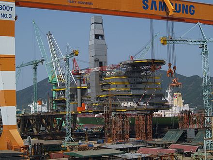 The world's largest oil and gas project, Sakhalin II- Lunskoye platform under construction. The topside facilities of the LUN-A (Lunskoye) and PA-B (Piltun Astokhskoye) platforms are being built at the Samsung Heavy Industry shipyard in South Korea.[164]