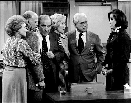 A scene from the final episode of The Mary Tyler Moore Show (from left): White as Sue Ann Nivens, Gavin MacLeod as Murray Slaughter, Ed Asner as Lou Grant, Georgia Engel as Georgette Franklin Baxter, Ted Knight as Ted Baxter, and Mary Tyler Moore as Mary Richards, 1977