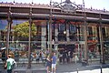 An exterior daylight view of the Mercado de San Miguel in Madrid