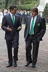 Herrera with former Mexican President Enrique Pena Nieto in 2014. MiguelPenaNieto.jpg